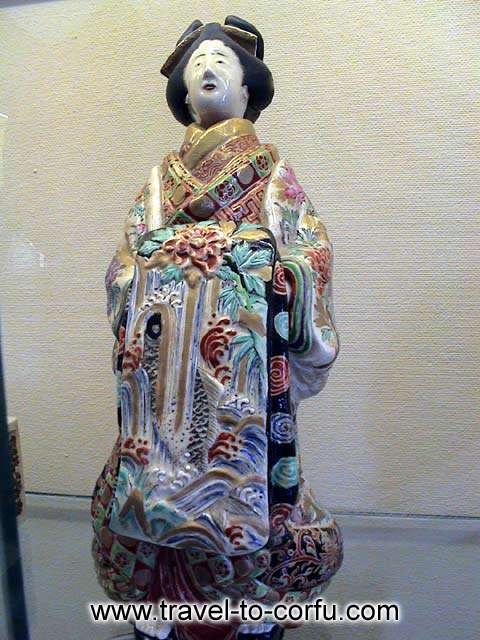 MUSEUM OF ASIAN ART - A porcelain statuette.