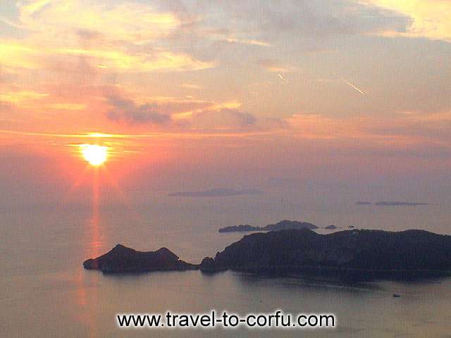 AGIOS GEORGIOS - Sunset at Agios Georgios beach...