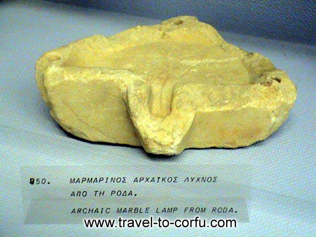 ARCHAIC MARBLE LAMP FROM RODA - An archaic marble lamp that was found to the excavations to the Roda area.